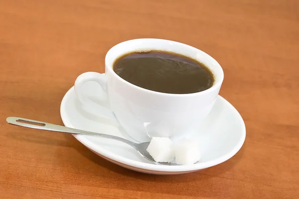 White cup of coffee on the table — Stock Photo, Image