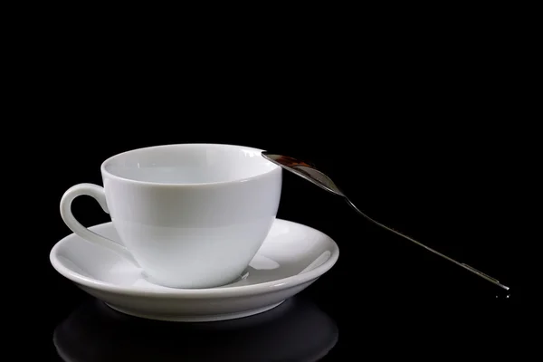 Białe filiżanka kawy z łyżeczką — Zdjęcie stockowe