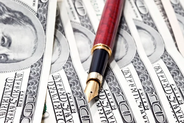 Close-up pen on the money — Stock Photo, Image