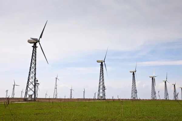 stock image Field with wind energy converters