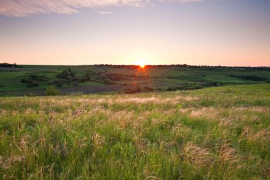 Countryside view at sunset time clipart