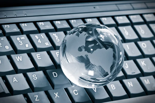 stock image Globe on laptop keyboard