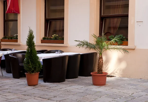 stock image Tables and chairs in a summer cafe