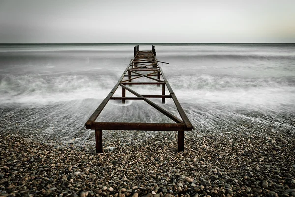 Old pier at the sea — Stock Photo, Image