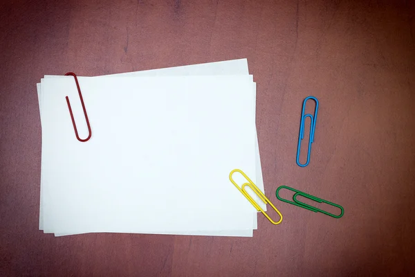 White paper note with a clips — Stock Photo, Image