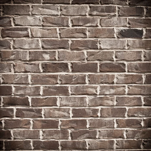 Parede de tijolo áspero — Fotografia de Stock