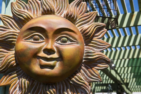 Smiling Ceramic sun face — Stock Photo, Image