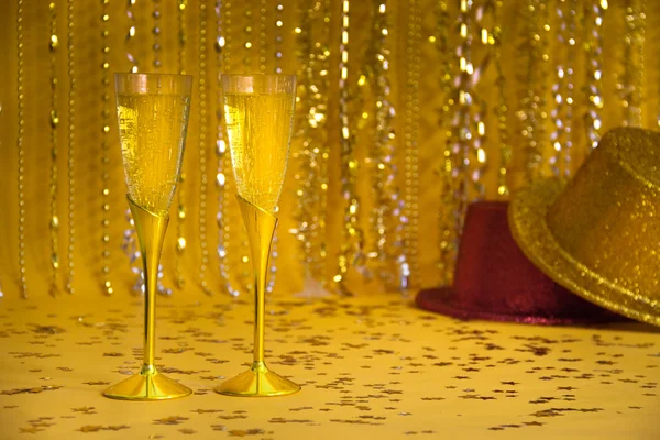 Gold Champagne Flutes and Party Hats