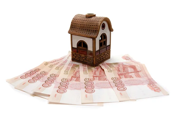 Toy house on Russian rubles — Stock Photo, Image