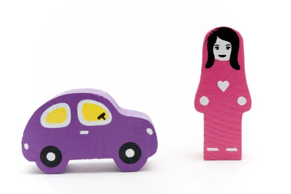 Wooden toys. Girl and car — Stock Photo, Image