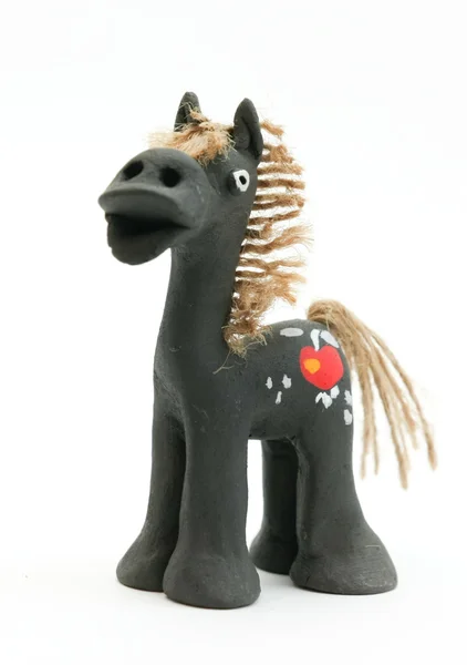 Clay horse on a white background — Stock Photo, Image