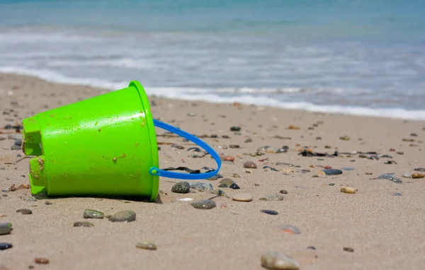 Children's bucket on the beach — Stock Photo, Image