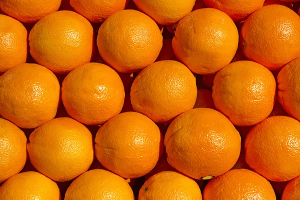 Свежие апельсины как фон — стоковое фото