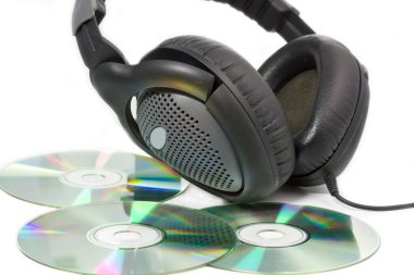 Compact Discs (CDs) with headphones clipart