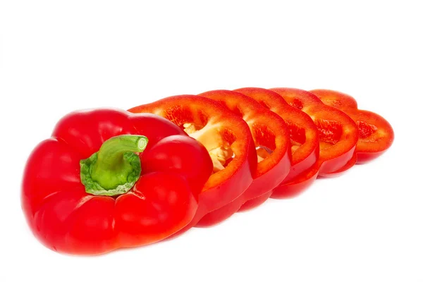 Nakrájené paprikové pepře na bílém pozadí — Stock fotografie