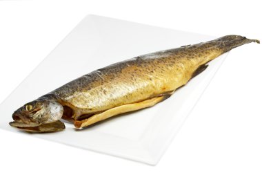 Smoked trout on a plate clipart