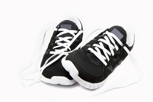 Sport skor på vit bakgrund — Stockfoto