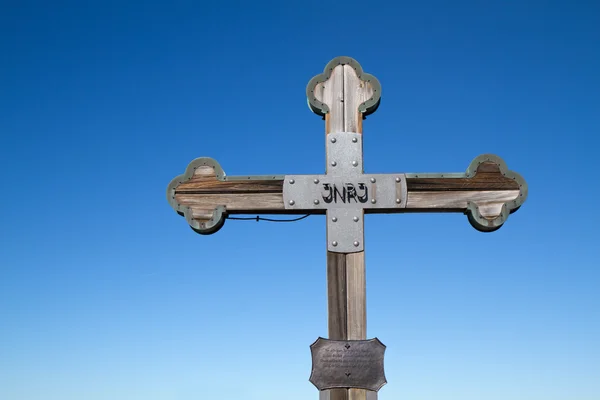Summit cross against blue sky — Stock Photo, Image