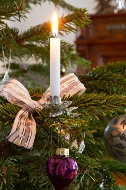 Christmas decoration, burning candle