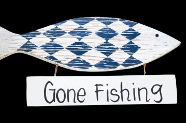 Wooden gone fishing sign, isolated on black background clipart