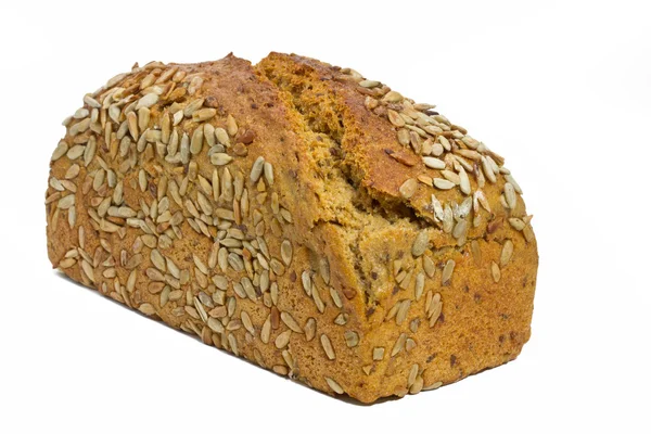 Loaf of fresh bread with sunflower seeds — Stock Photo, Image