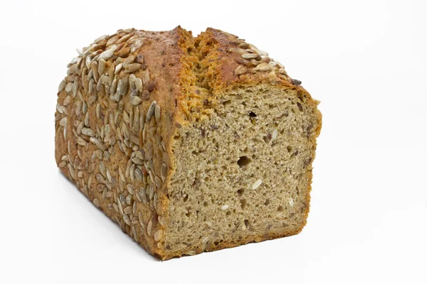 Loaf of fresh bread with sunflower seeds — Zdjęcie stockowe