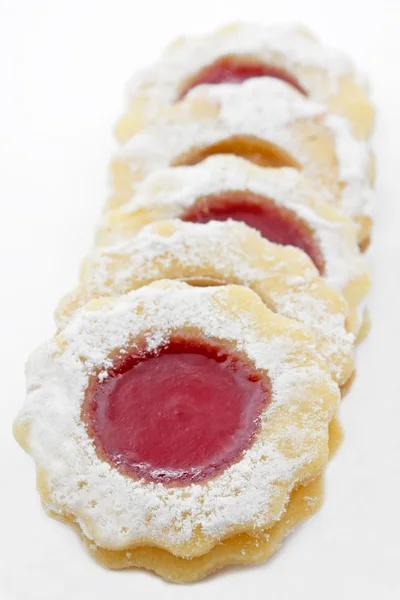 Delicious christmas cookies with raspberry jam — Stock Photo, Image
