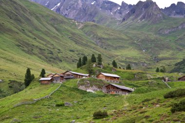 Mountain huts in South Tyrol, Italy clipart