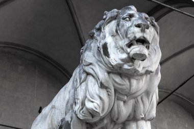 Stone lion statue at the Feldherrnhalle in Munich, Bavaria clipart