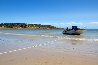 Motorboat at St. Brelade's Bay, Jersey, UK clipart