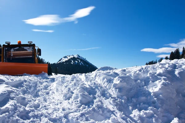 stock image Winter landscape with snow plough and blue sky