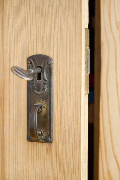 Open cabinet door — Stock Photo, Image