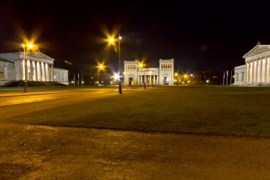 The historic Koenigsplatz square in Munich, Germany, at night clipart