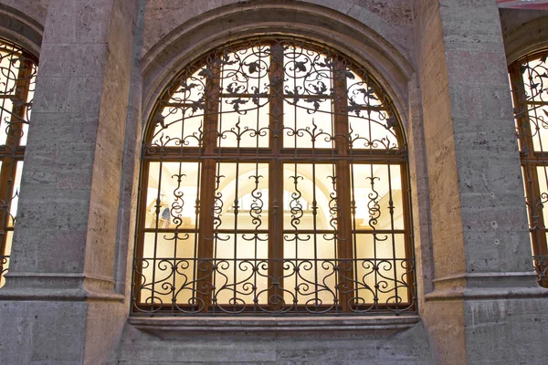 stock image Historic Window at the new town hall in Munich at night