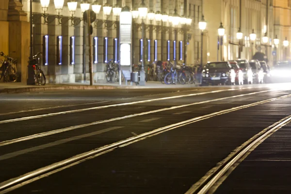 Tram rails in historic Munich, Germany, at night — Stock Photo, Image