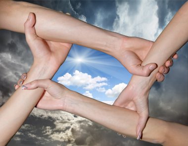 Couple hands connecting to a chain with blue sky clipart