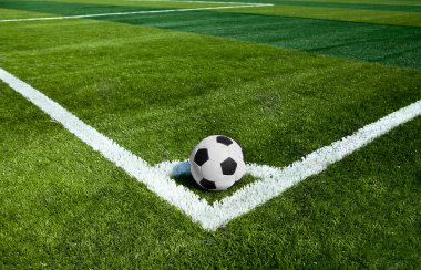 Football grass background in light and shadow clipart