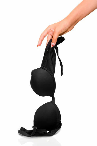The woman puts a bra — Stock Photo, Image