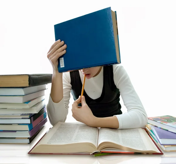 The girl and is a lot of textbooks. It is isolated — Stock Photo, Image