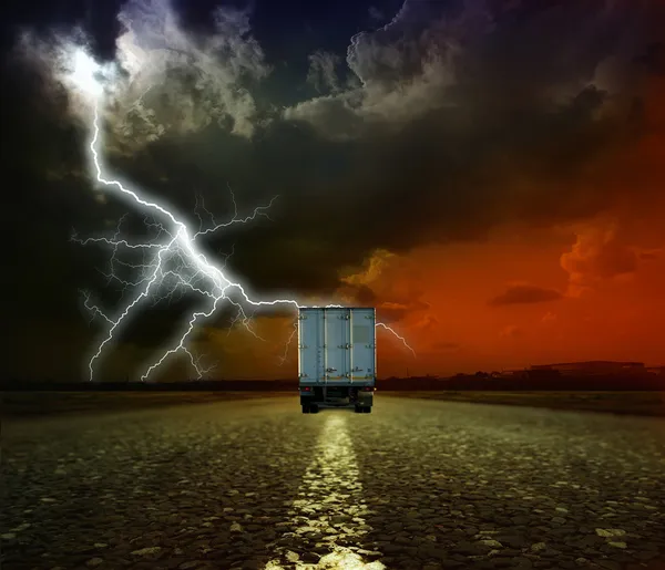 Truck on a road in the evening — Stock Photo, Image