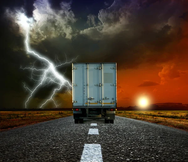 stock image Truck on a road in the evening