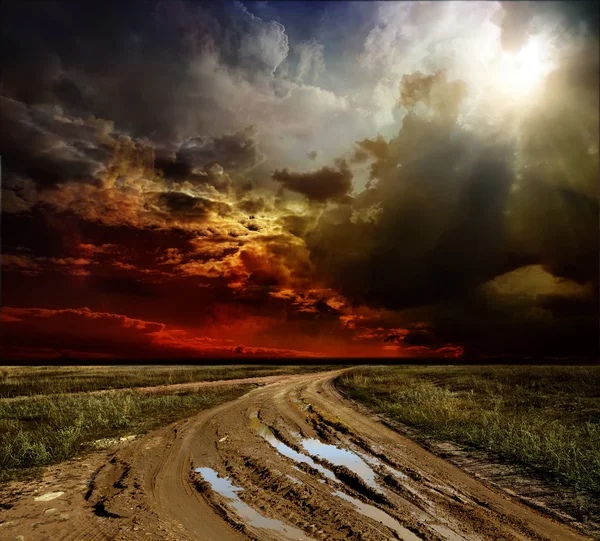 Countryside landscape with dirt road after rain, Russia — Stock Photo, Image