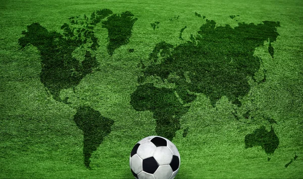 stock image World map on a green lawn