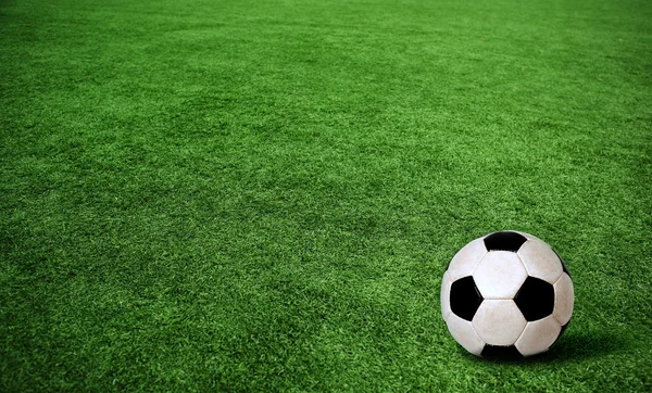 Soccer ball on green grass — Stock Photo, Image