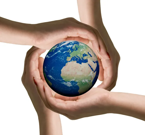 Hands of women and the globe — Stock Photo, Image