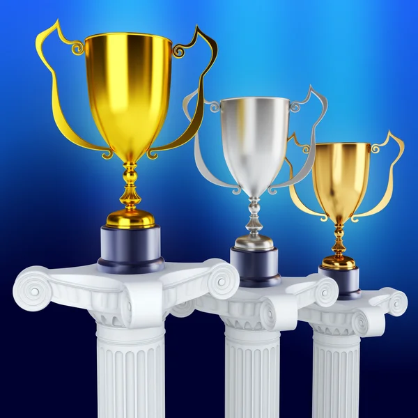 Gold silver and bronze trophy's on a pedestal — Stock Photo, Image