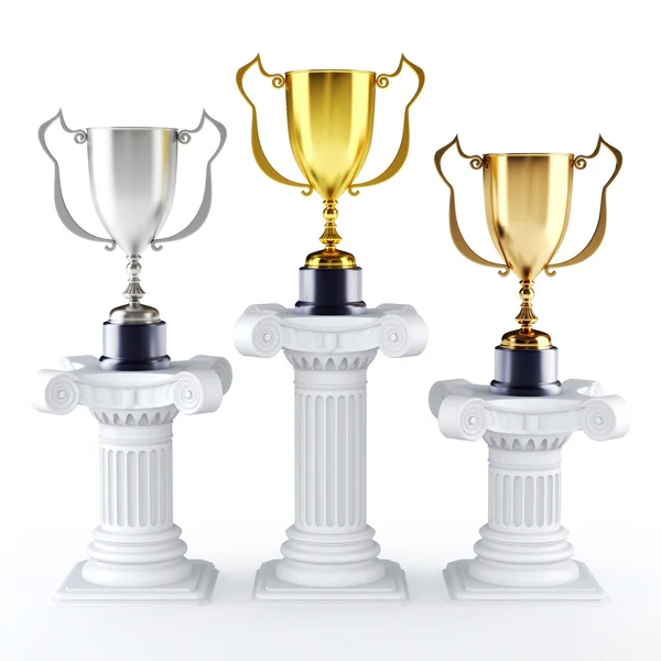 Gold silver and bronze trophy's on a pedestal — Stock Photo, Image