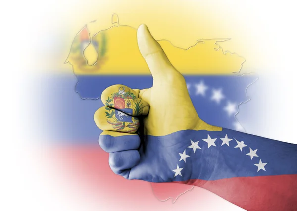 Pouce levée avec drapeau Venezuela peint numériquement sur le corps Photo De Stock