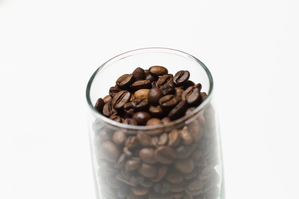 Kahve çekirdekleri ile cam — Stok fotoğraf