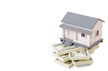 Model house on dollars clipart